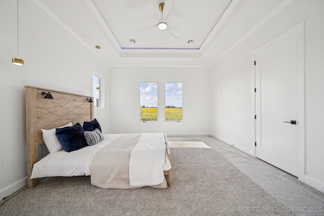 2357 E 134th Cir, Bixby, OK 74008 - carpeted bedroom featuring a raised ceiling and ceiling fan