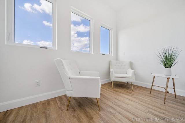2357 E 134th Cir, Bixby, OK 74008 - sitting room featuring wood finished floors and baseboards