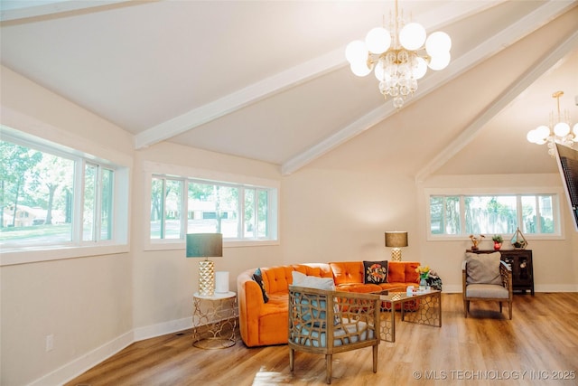 2232 Gershwin Dr, Durant, OK 74701 - living room with a chandelier, healthy amount of natural light, and wood finished floors