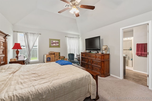 10101 S 232nd E Ave, Broken Arrow, OK 74014 - carpeted bedroom featuring vaulted ceiling, baseboards, a ceiling fan, and connected bathroom