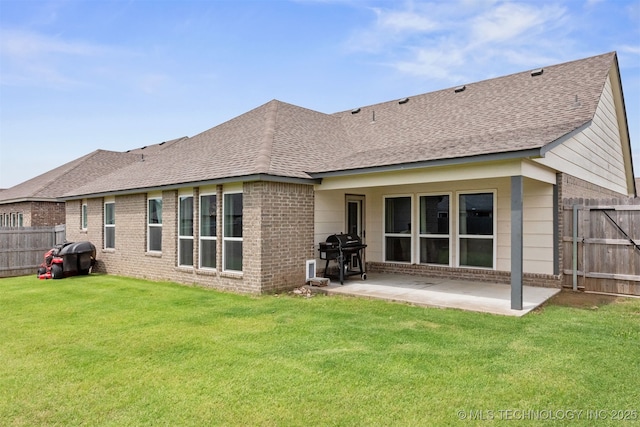 10101 S 232nd E Ave, Broken Arrow, OK 74014 - back of house with brick siding, a patio, and a shingled roof