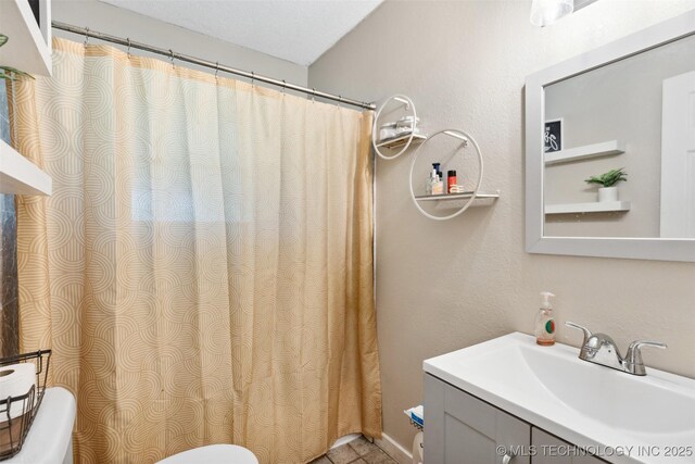 11200 E 112th St N, Owasso, OK 74055 - full bath featuring toilet, vanity, and a shower with shower curtain