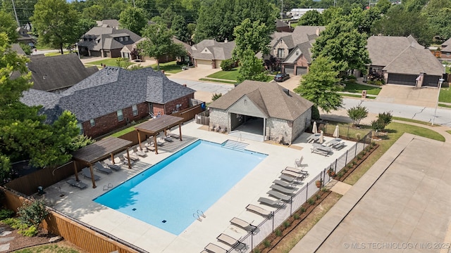 8906 E 110th St, Tulsa, OK 74133 - community pool with a residential view and a patio