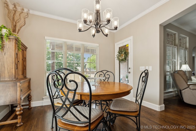 8906 E 110th St, Tulsa, OK 74133 - dining room featuring baseboards, dark wood finished floors, crown molding, and a chandelier