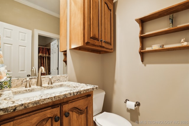 8906 E 110th St, Tulsa, OK 74133 - full bath with vanity, toilet, and crown molding