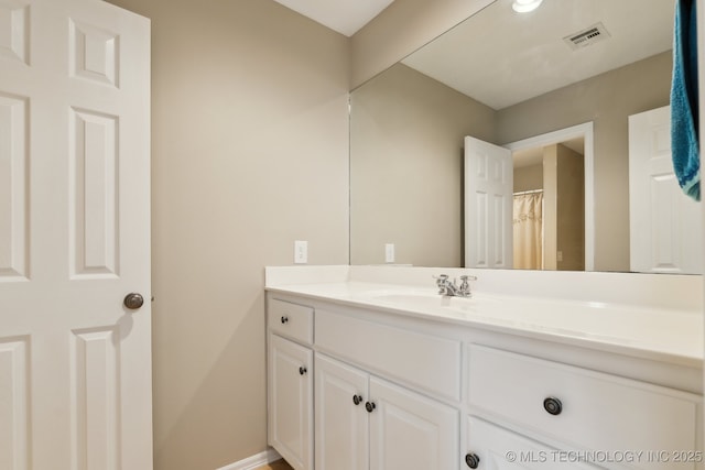 8906 E 110th St, Tulsa, OK 74133 - bathroom featuring vanity and baseboards