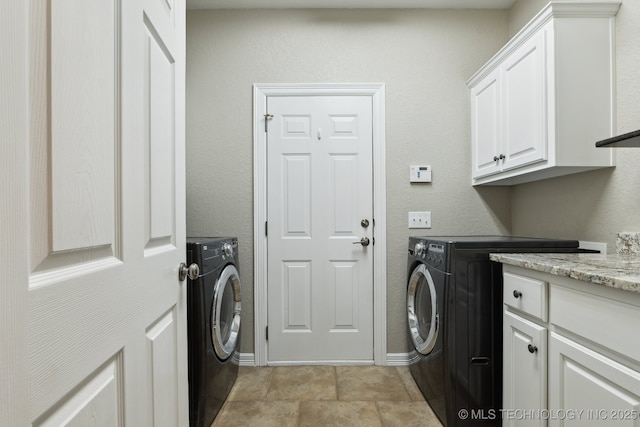 8906 E 110th St, Tulsa, OK 74133 - laundry room with cabinet space, washer and dryer, and baseboards