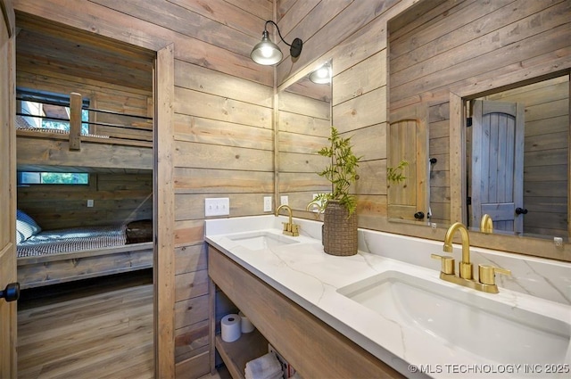 475 Bear Pine Trl, Broken Bow, OK 74728 - ensuite bathroom featuring wooden walls and double vanity