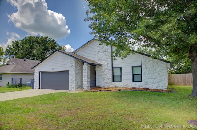 13866 S Nyssa Pl, Glenpool, OK 74033 - view of front of property with stone siding, an attached garage, and concrete driveway