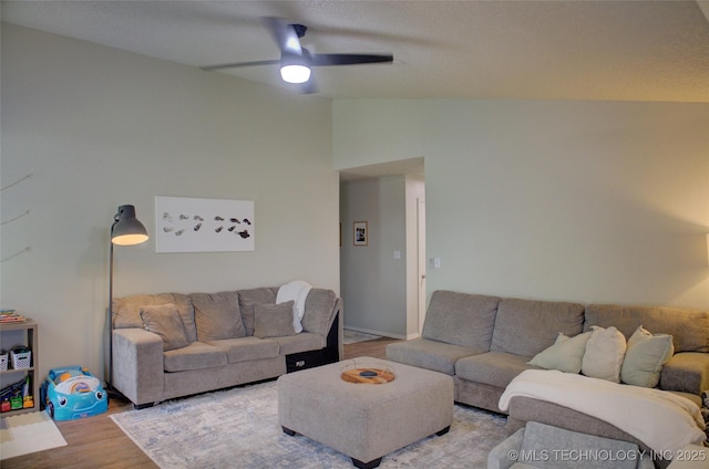 13866 S Nyssa Pl, Glenpool, OK 74033 - living room featuring vaulted ceiling, wood finished floors, and ceiling fan