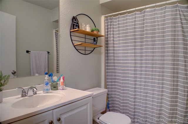 13866 S Nyssa Pl, Glenpool, OK 74033 - bathroom featuring toilet, a textured wall, vanity, and a shower with shower curtain