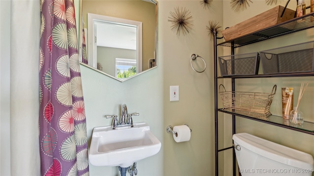 30955 S 4240th Rd, Inola, OK 74036 - bathroom with a sink, toilet, and a shower with shower curtain