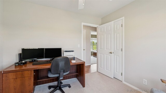 30955 S 4240th Rd, Inola, OK 74036 - home office featuring light colored carpet, a ceiling fan, and baseboards