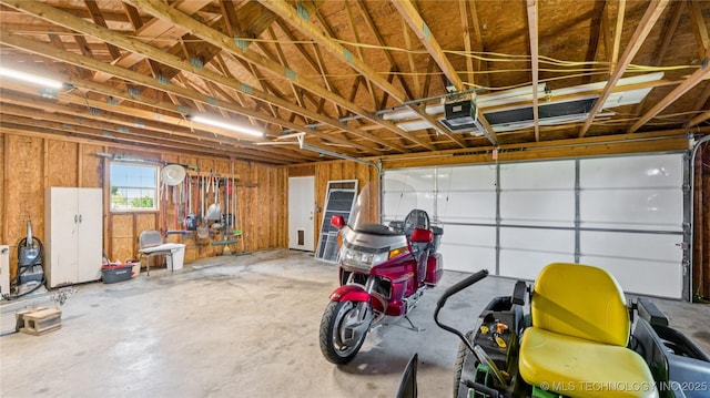 30955 S 4240th Rd, Inola, OK 74036 - garage featuring a garage door opener