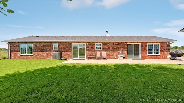 30955 S 4240th Rd, Inola, OK 74036 - rear view of house with a patio area, cooling unit, and brick siding