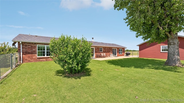 30955 S 4240th Rd, Inola, OK 74036 - rear view of house with brick siding and a patio area