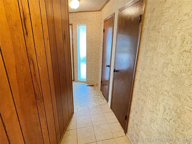 116800 S 4300th Rd, Porum, OK 74455 - hallway featuring light tile patterned floors and crown molding