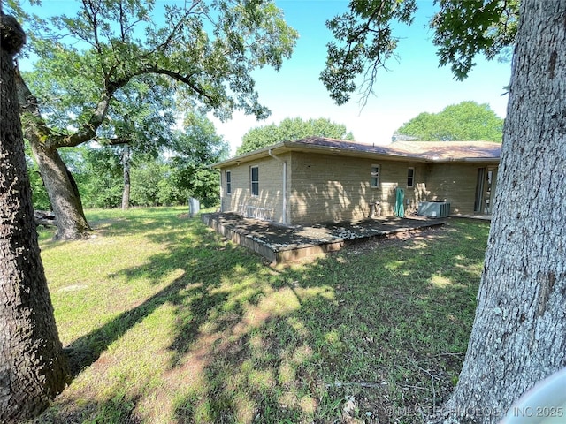 116800 S 4300th Rd, Porum, OK 74455 - view of home's exterior with a yard and cooling unit