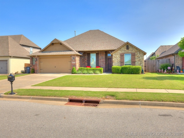 18210 E 49th St, Tulsa, OK 74134 - view of front of property featuring an attached garage, a shingled roof, concrete driveway, and brick siding