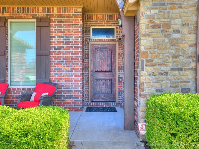 18210 E 49th St, Tulsa, OK 74134 - property entrance featuring brick siding