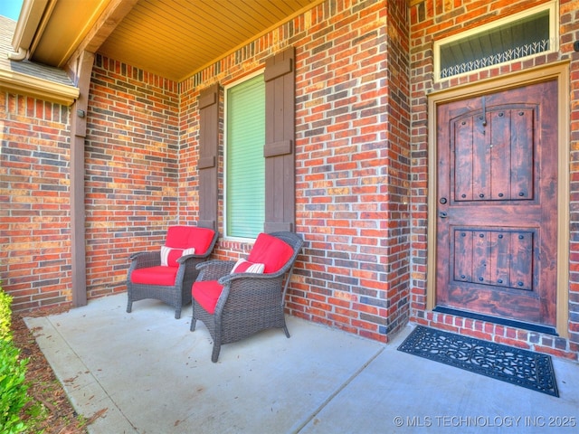 18210 E 49th St, Tulsa, OK 74134 - property entrance featuring brick siding