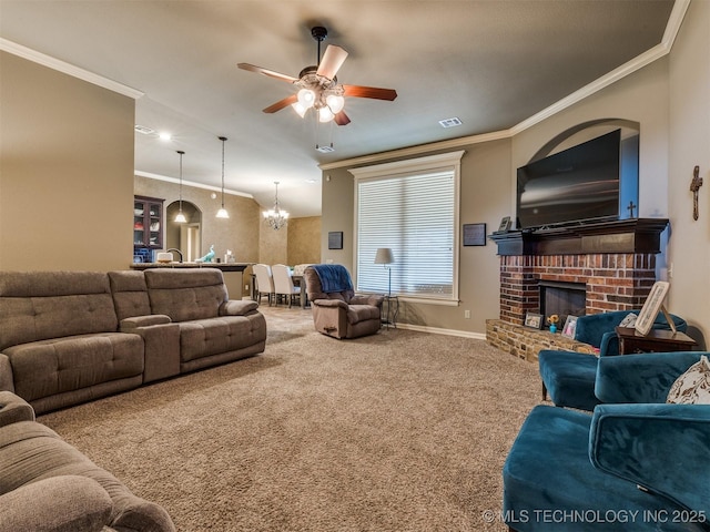 18210 E 49th St, Tulsa, OK 74134 - living area with a ceiling fan, carpet floors, crown molding, baseboards, and a fireplace