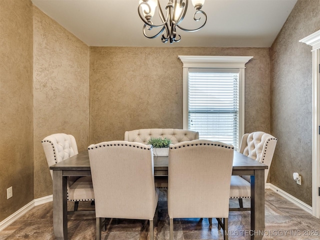 18210 E 49th St, Tulsa, OK 74134 - dining area featuring a chandelier and baseboards