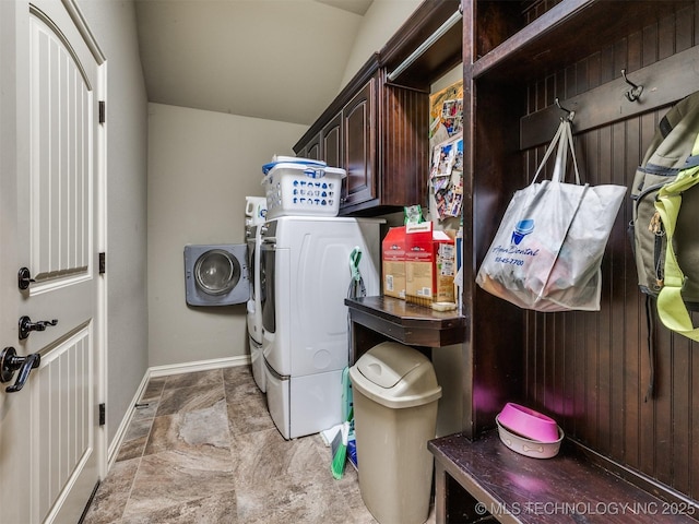 18210 E 49th St, Tulsa, OK 74134 - laundry area with independent washer and dryer, baseboards, cabinet space, and light stone finish flooring