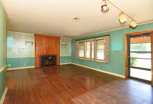 464 S Allegheny Ave, Tulsa, OK 74112 - unfurnished living room with wood finished floors, baseboards, a fireplace, and crown molding