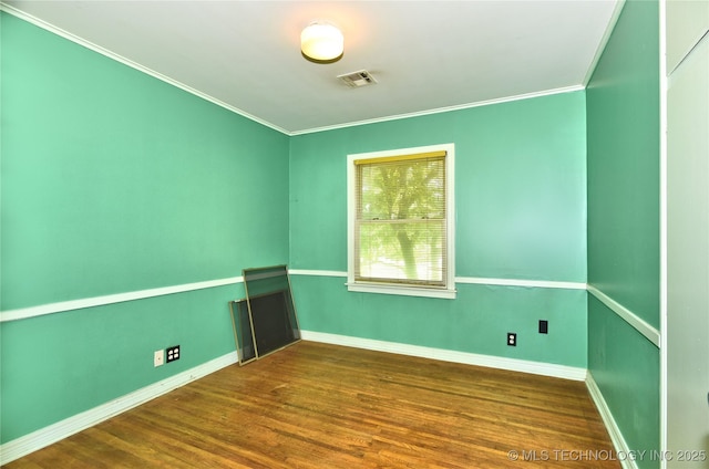 464 S Allegheny Ave, Tulsa, OK 74112 - empty room featuring crown molding, wood finished floors, and baseboards