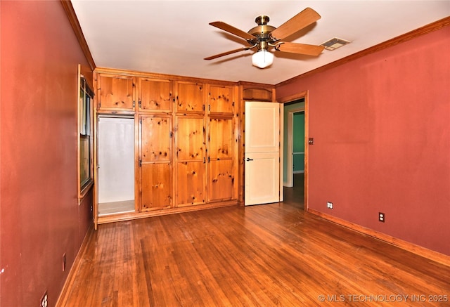 464 S Allegheny Ave, Tulsa, OK 74112 - unfurnished bedroom with baseboards, wood finished floors, ornamental molding, and ceiling fan
