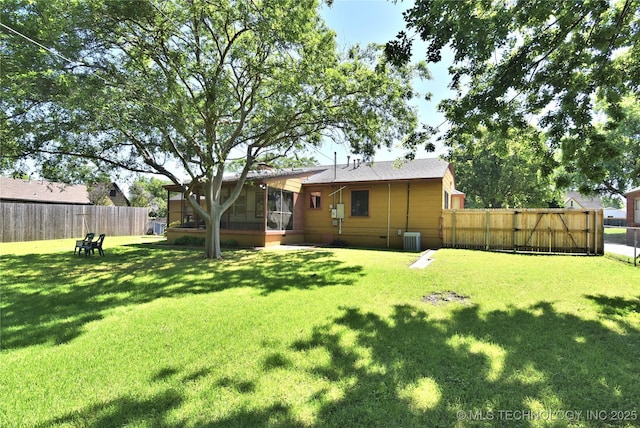 464 S Allegheny Ave, Tulsa, OK 74112 - back of property featuring central AC and a sunroom