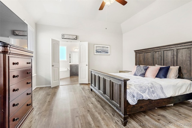 2023 E 133rd St S, Bixby, OK 74008 - bedroom featuring light wood finished floors, ensuite bath, ceiling fan, and baseboards
