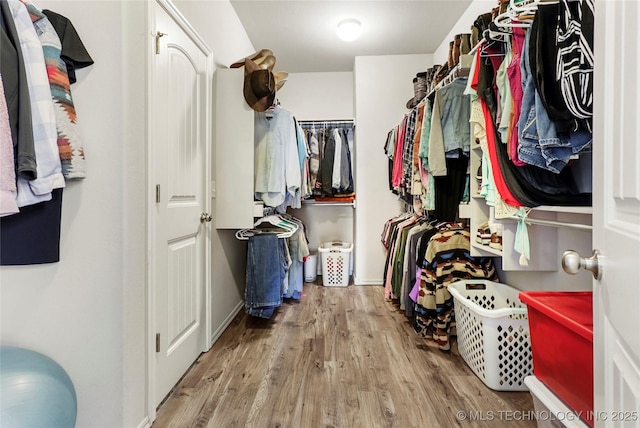 2023 E 133rd St S, Bixby, OK 74008 - walk in closet with wood finished floors