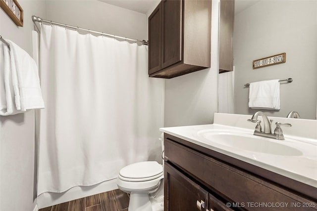 2023 E 133rd St S, Bixby, OK 74008 - full bathroom with vanity, toilet, wood finished floors, and shower / bath combination with curtain