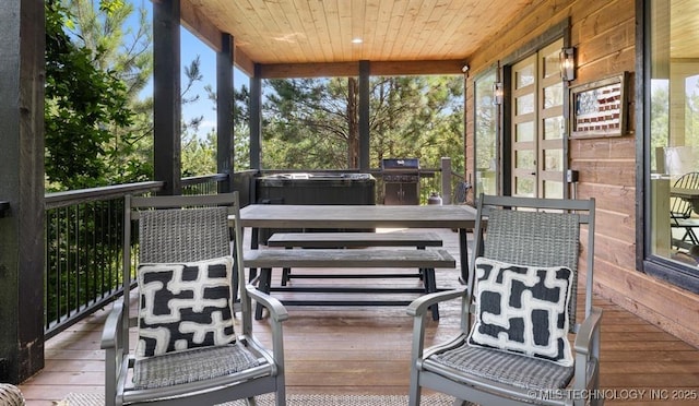 62 Hickory Canyon Trl, Broken Bow, OK 74728 - sunroom / solarium with plenty of natural light and a hot tub