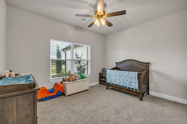 5769 S 256th E Ave, Broken Arrow, OK 74014 - bedroom with carpet flooring, baseboards, and a ceiling fan