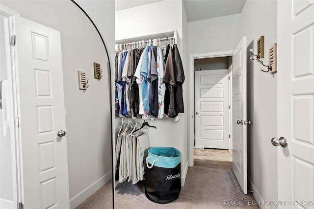 8617 E Hartford St, Broken Arrow, OK 74014 - walk in closet featuring carpet