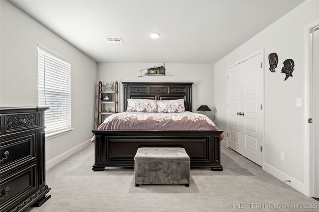 8617 E Hartford St, Broken Arrow, OK 74014 - bedroom featuring light carpet and baseboards