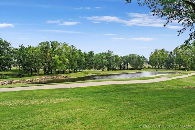 8617 E Hartford St, Broken Arrow, OK 74014 - view of community with a water view, a lawn, and view of scattered trees