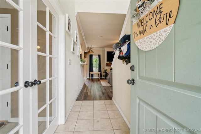 2704 W Imperial St, Broken Arrow, OK 74011 - corridor with tile patterned floors, baseboards, ornamental molding, and french doors