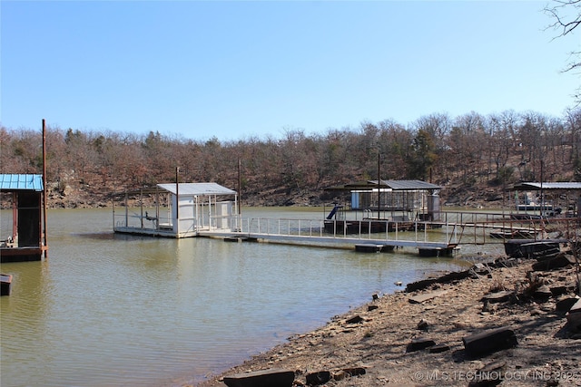 232 N Erie St, Eufaula, OK 74425 - dock featuring a water view and a wooded view