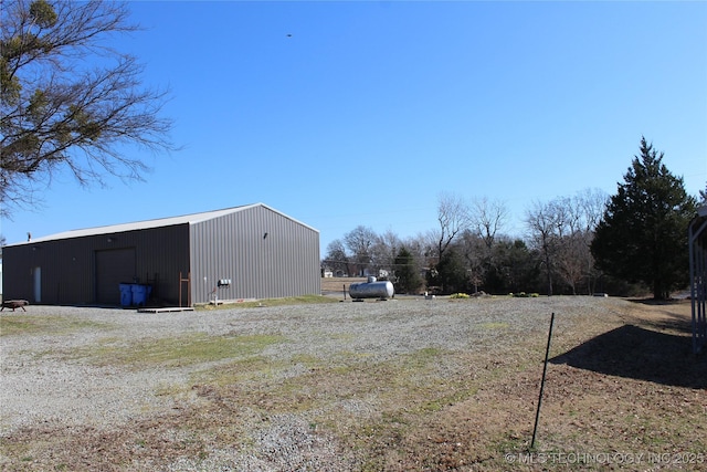 232 N Erie St, Eufaula, OK 74425 - view of yard featuring a pole building and an outdoor structure