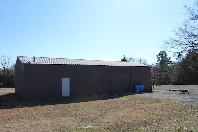 232 N Erie St, Eufaula, OK 74425 - view of outdoor structure featuring driveway