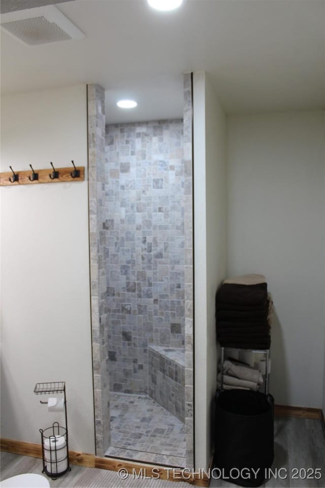 232 N Erie St, Eufaula, OK 74425 - full bathroom with tiled shower, wood finished floors, and recessed lighting