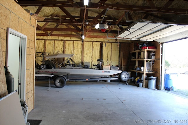 232 N Erie St, Eufaula, OK 74425 - garage with a garage door opener