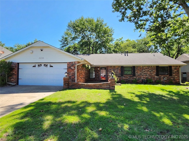 2230 Robin Ln, Muskogee, OK 74403 - ranch-style house featuring an attached garage, concrete driveway, a front yard, and brick siding