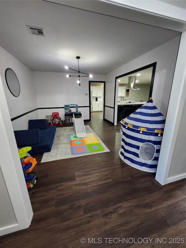 2230 Robin Ln, Muskogee, OK 74403 - rec room with dark wood-type flooring