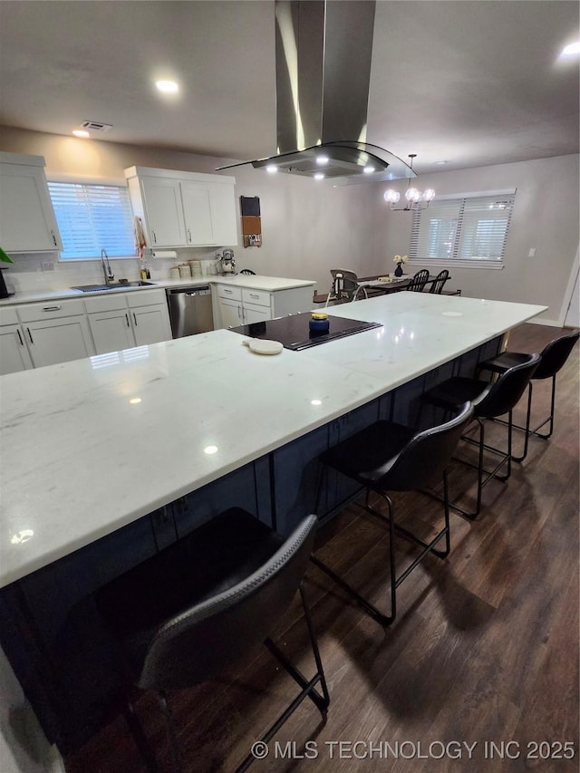 2230 Robin Ln, Muskogee, OK 74403 - kitchen featuring a sink, stainless steel dishwasher, island exhaust hood, a breakfast bar, and dark wood-type flooring