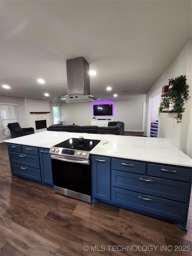 2230 Robin Ln, Muskogee, OK 74403 - kitchen featuring stainless steel electric range oven, island exhaust hood, blue cabinets, open floor plan, and dark wood-type flooring